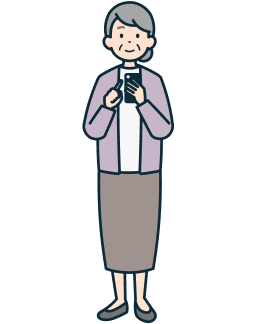 スマホを持った高齢のお客さま（女性）の全身