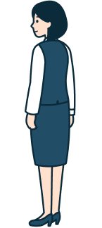 窓口社員（女性）の全身背面斜め