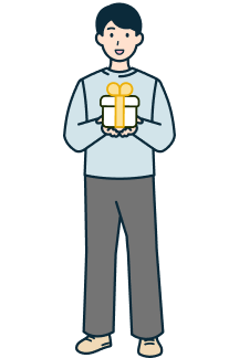 プレゼントを持ったお客さま（男性）の全身