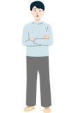 腕を組んだ困り顔のお客さま（男性）の全身