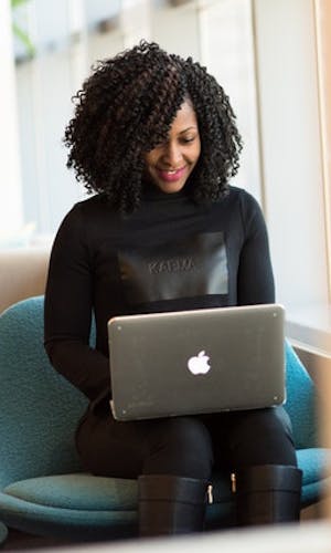 Woman Holding Macbook