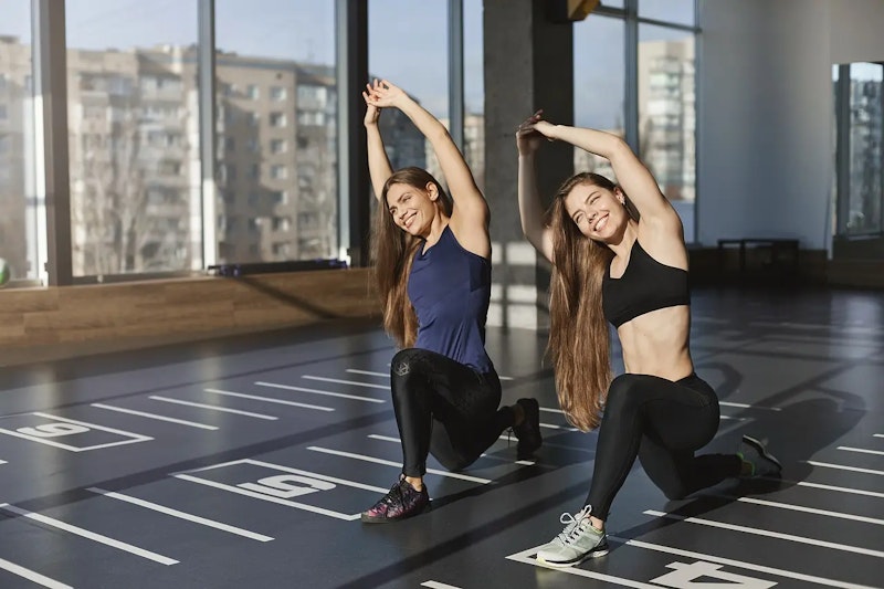 Beginner woman doing personal training at home with guidance