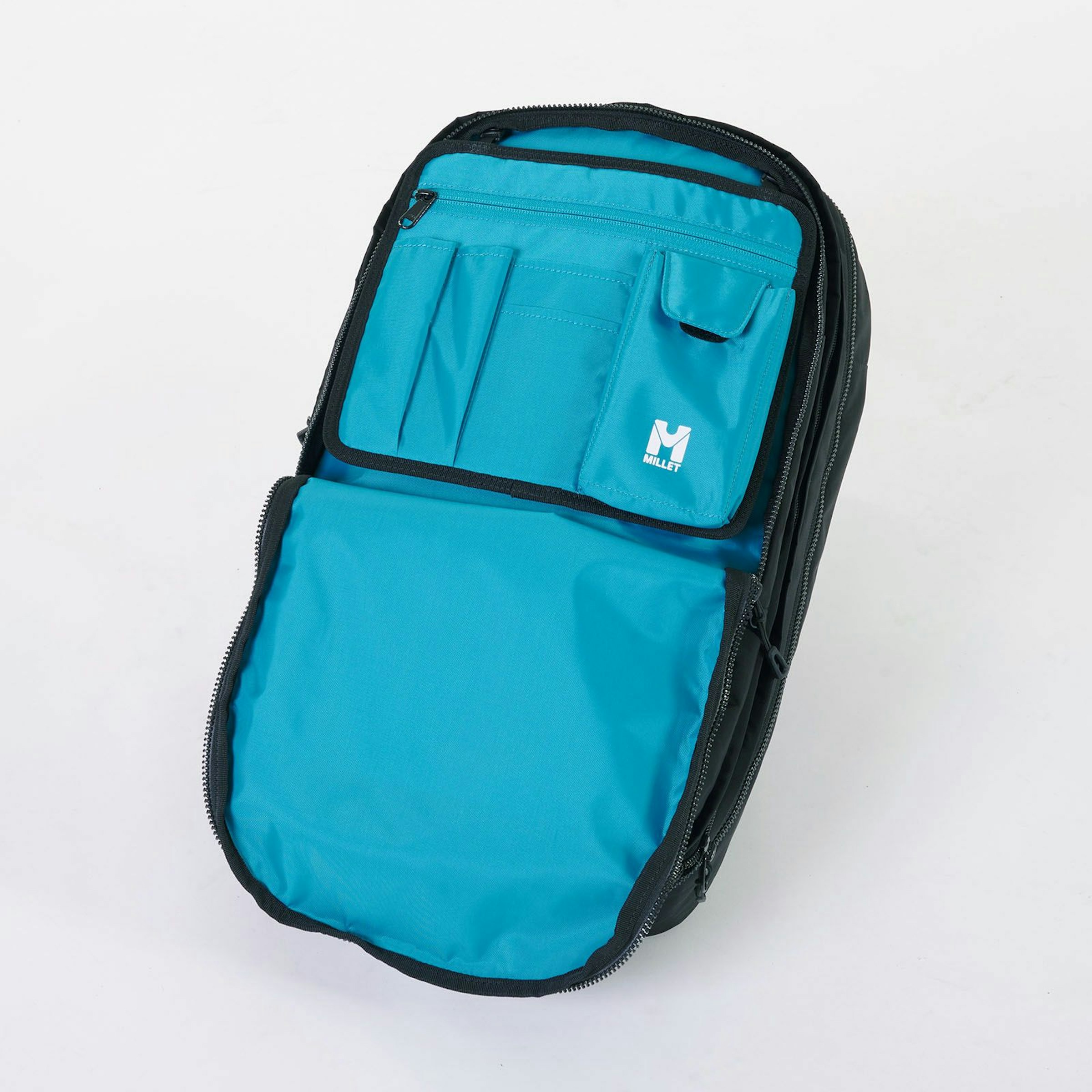 A hanging-style organizer appears when you open the zipper on the front of the backpack