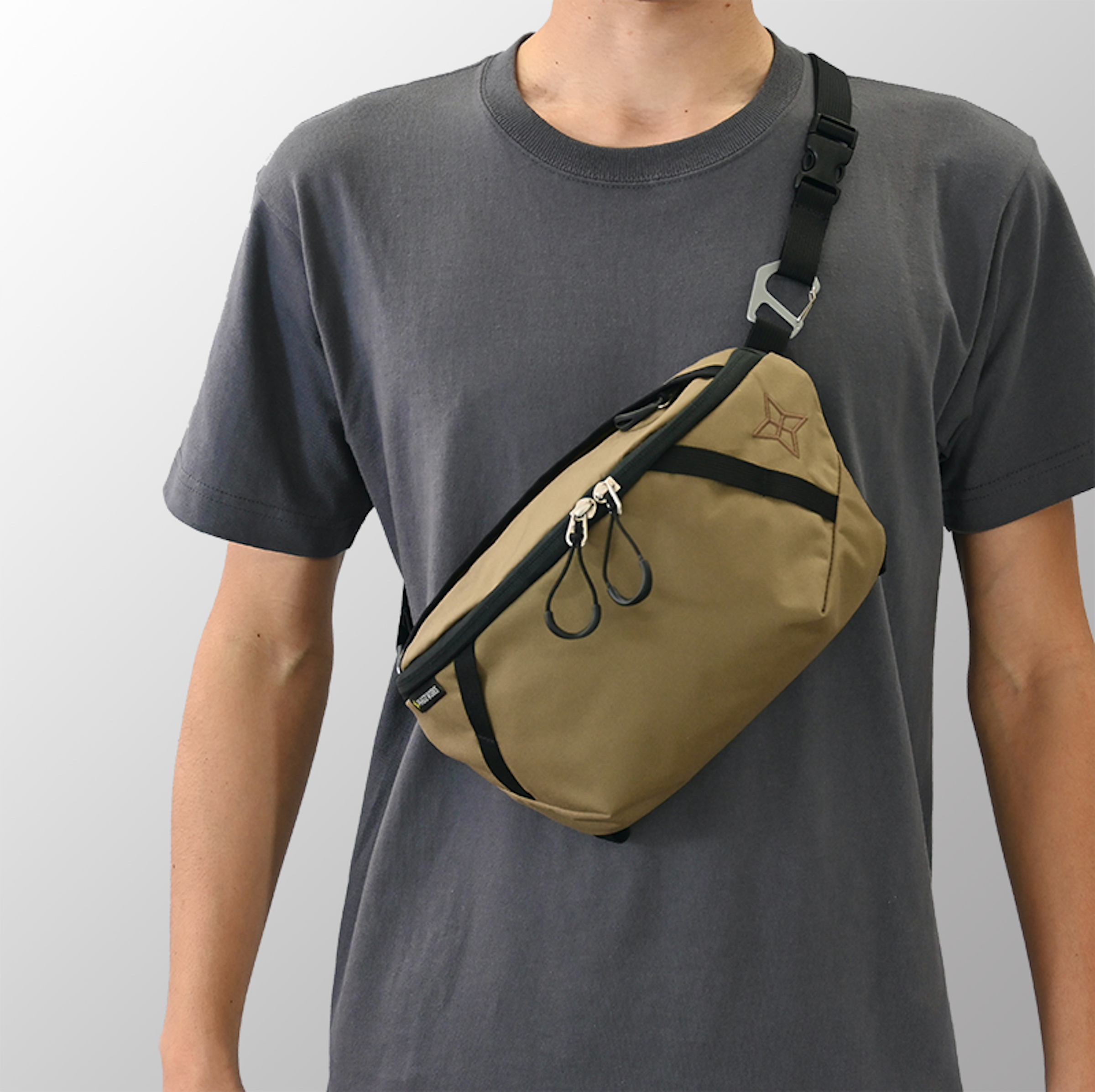 When worn over the shoulder with the included belt as a shoulder bag or body bag, it can hold more items than a satchel and provides stability as the center of gravity is closer to the body.