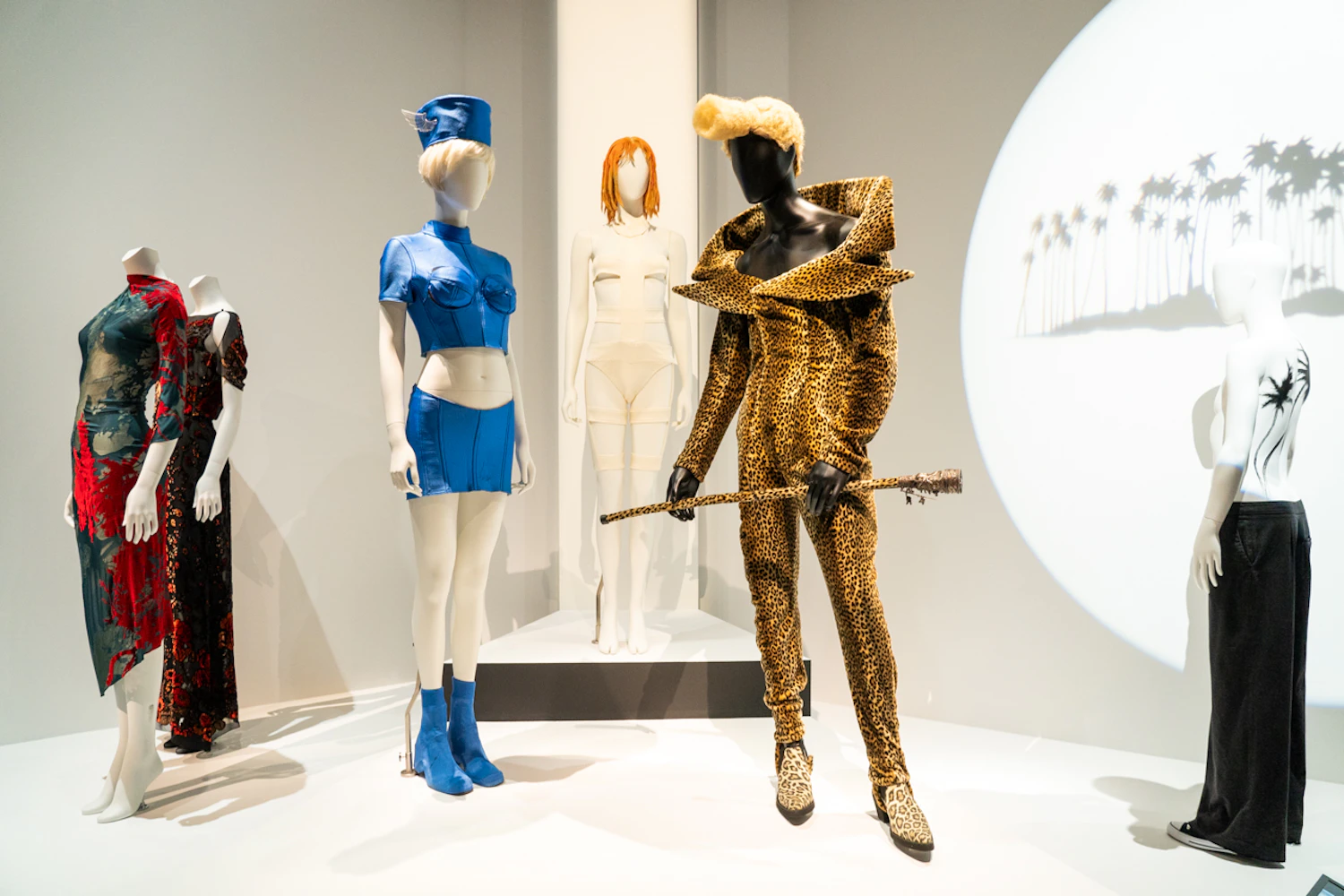 Jean Paul Gaultier's costumes for the movie "The Fifth Element" (middle three figures)
