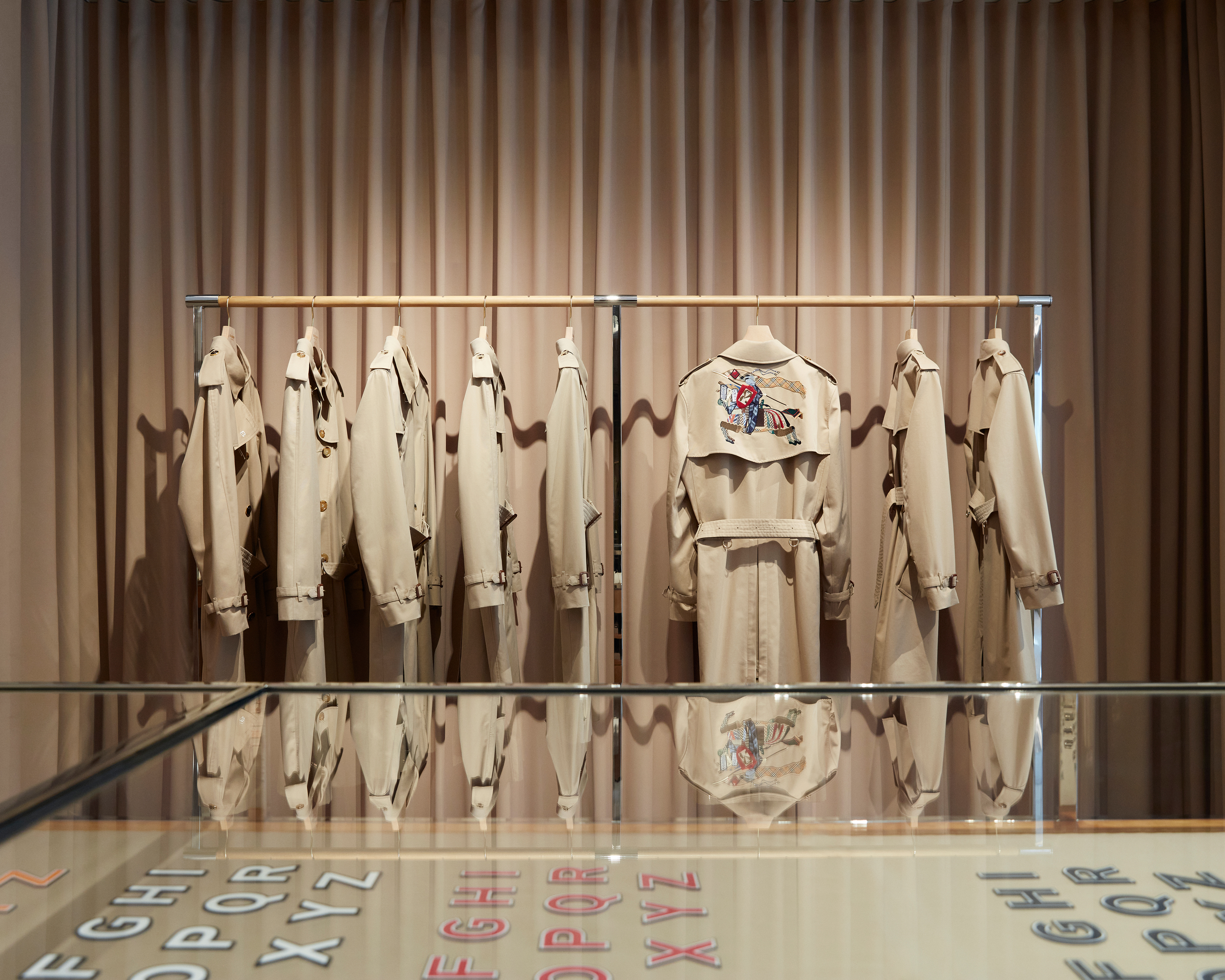 From Military Wear to It Fashion Tracing the History of the Trench Coat Created by Burberry Fashion Tech News