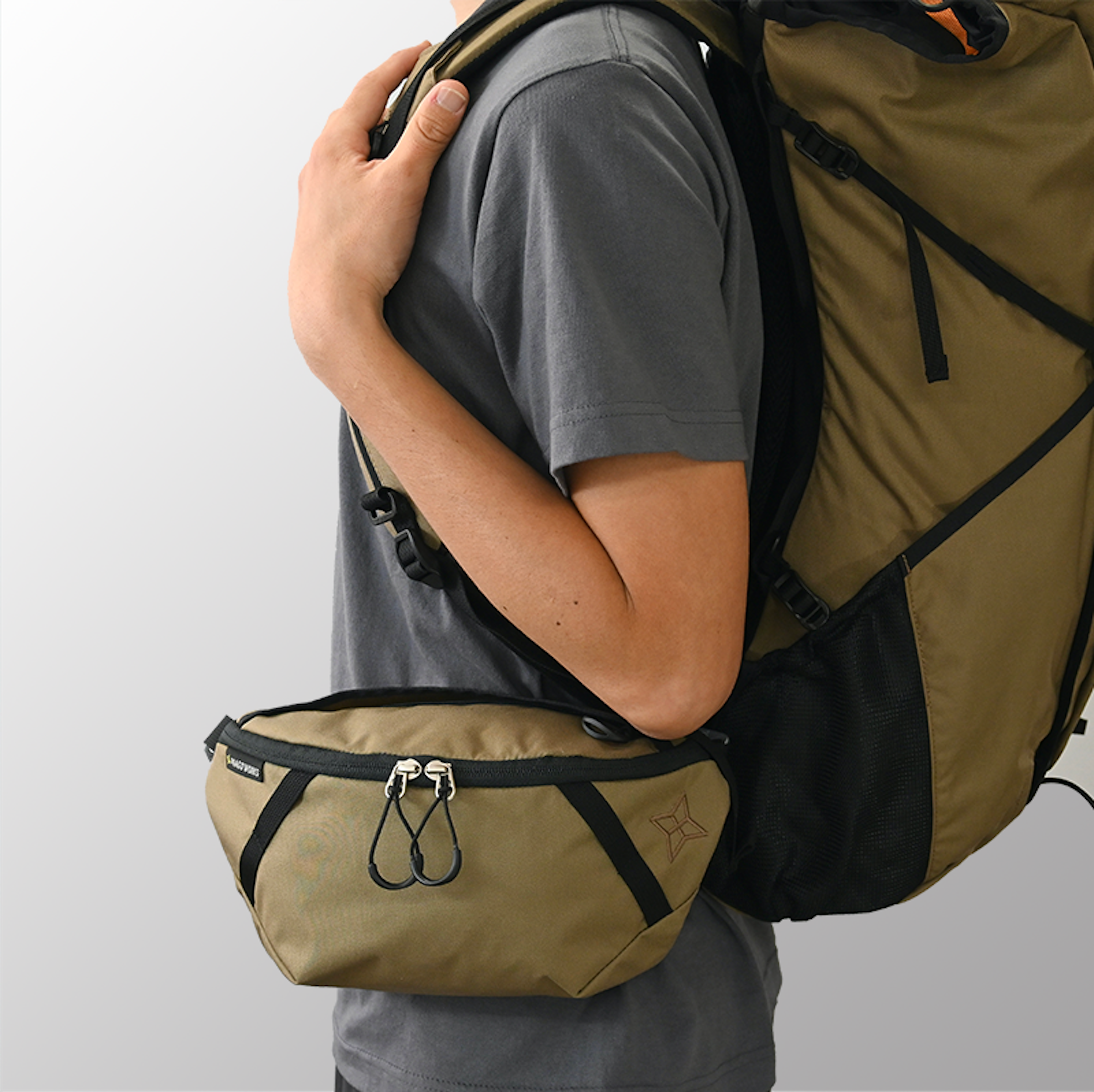 If you thread the backpack's waist belt through the loop on the back of the 'Switch', it can also be used as a sidebag