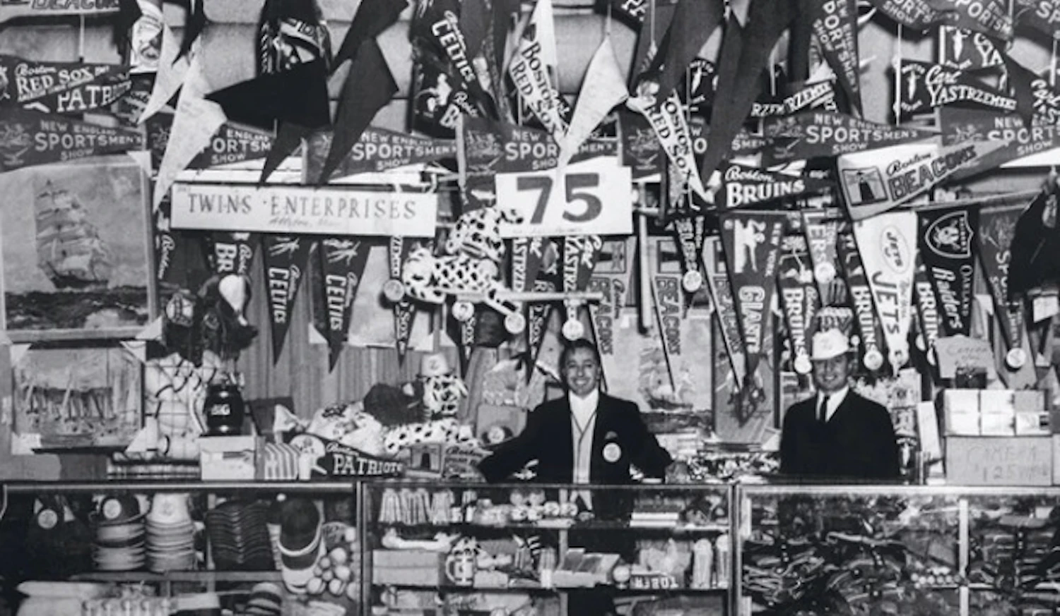 A variety of goods including pennants were sold in the souvenir shop run by the company 'Twins Enterprises' which was founded by Arthur and Henry in 1947.