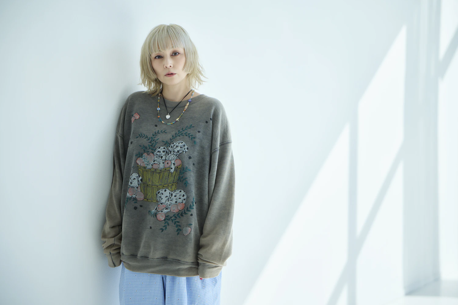 高校時代、由美さんは地元大阪のアメ村にあった古着屋で安い服を買い漁っていたという