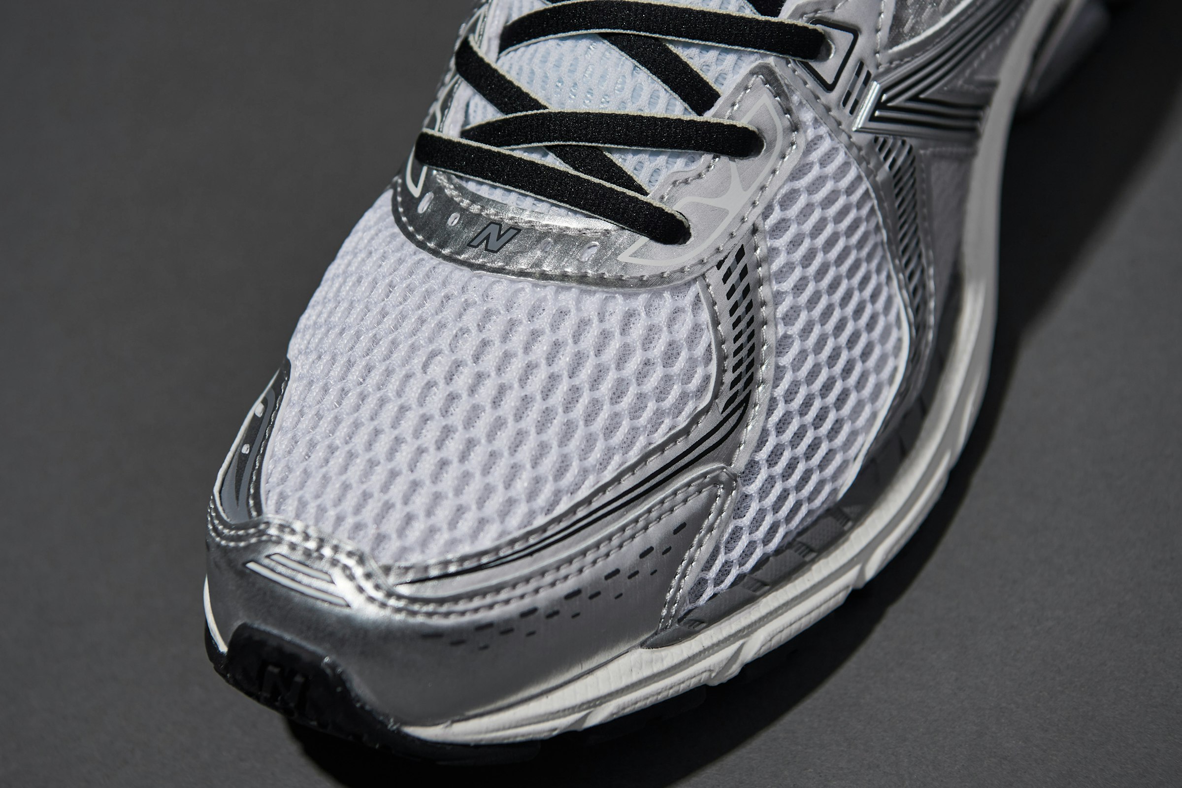 The open mesh upper and silver parts are the details that make these a true representation of 'Dad Shoes'.