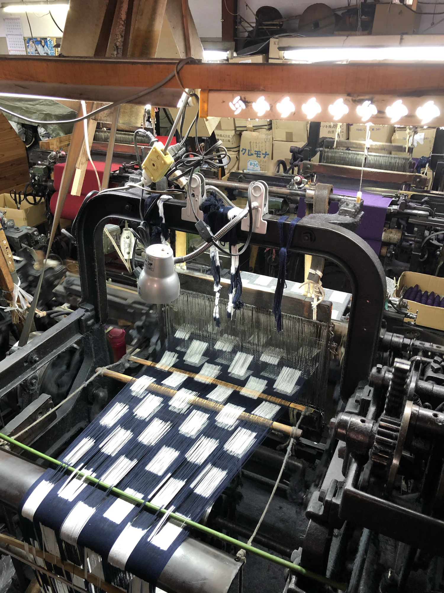 A loom for Kurume kasuri, weaving the dyed kasuri yarns. (Photo by the author at Shimogawa Orimono)