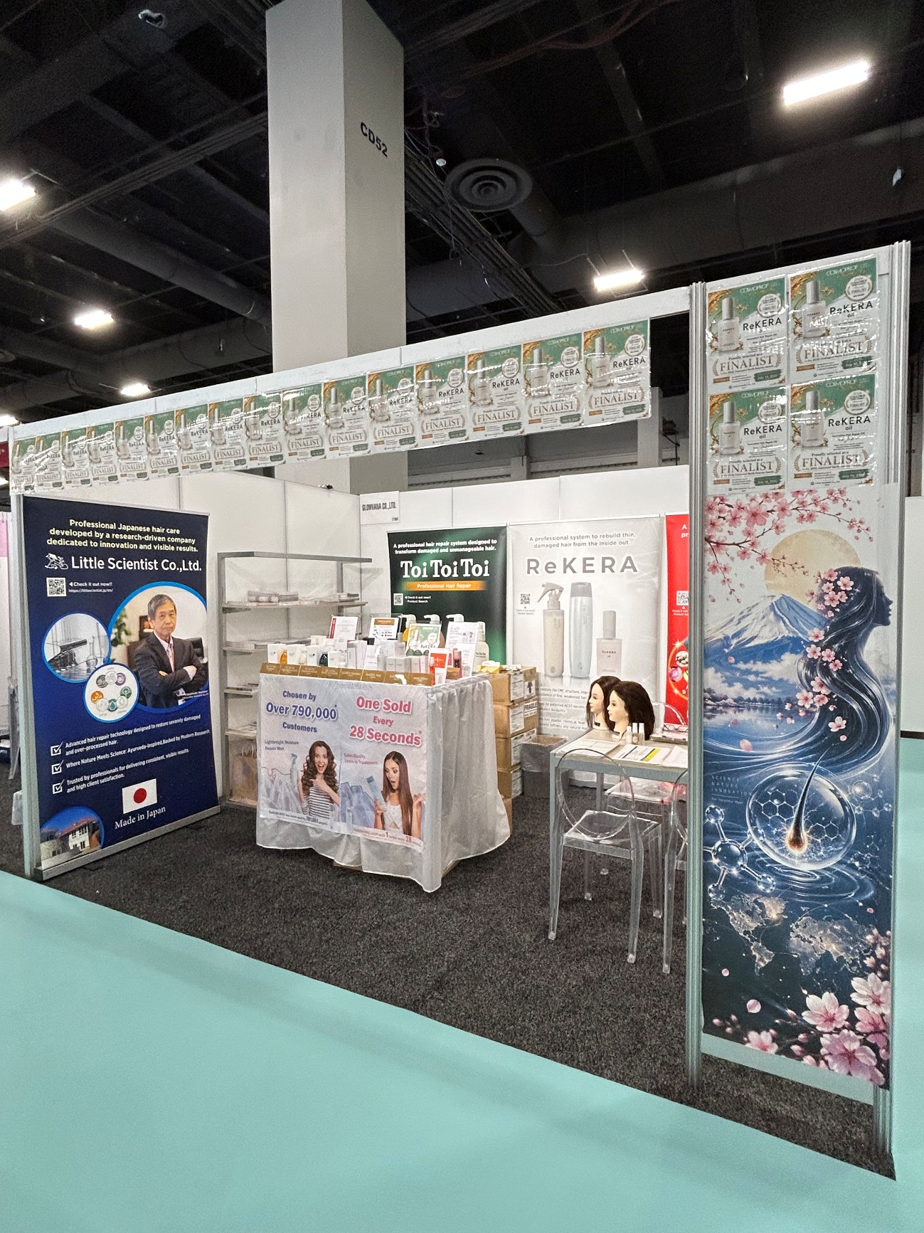 [Photo: Booth and product display]