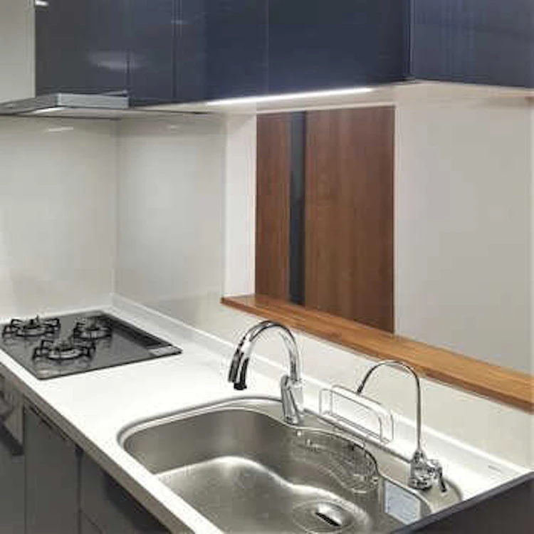 事例1 低くて使いにくいシステムキッチンのリフォーム