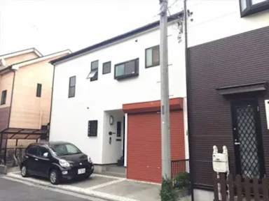 外壁・シャッターを鮮やかカラーで塗装してイメージ一新