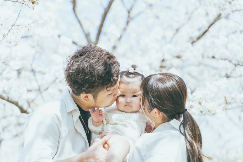 桜の春日公園で、家族写真