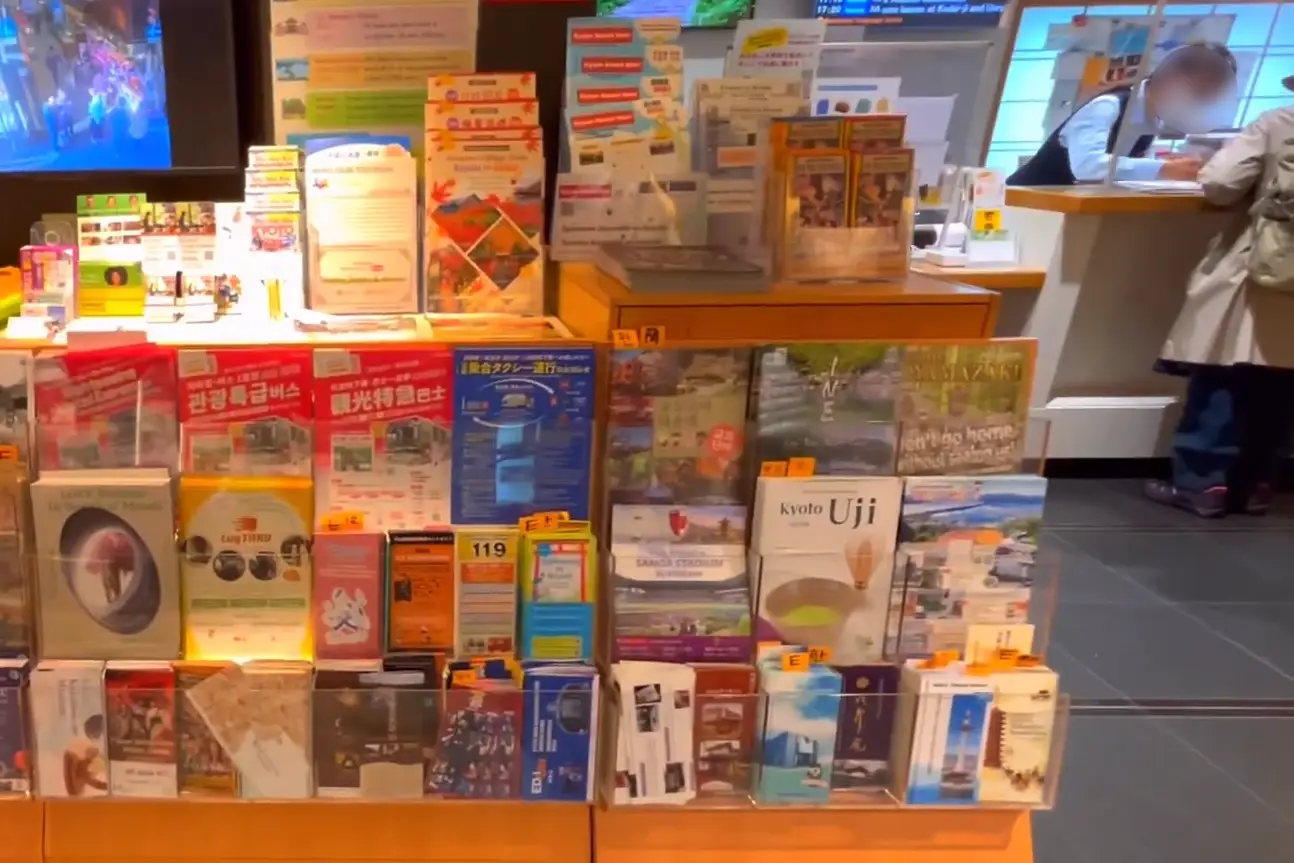 Tourist brochures for international visitors at Kyoto Station’s tourist information center
