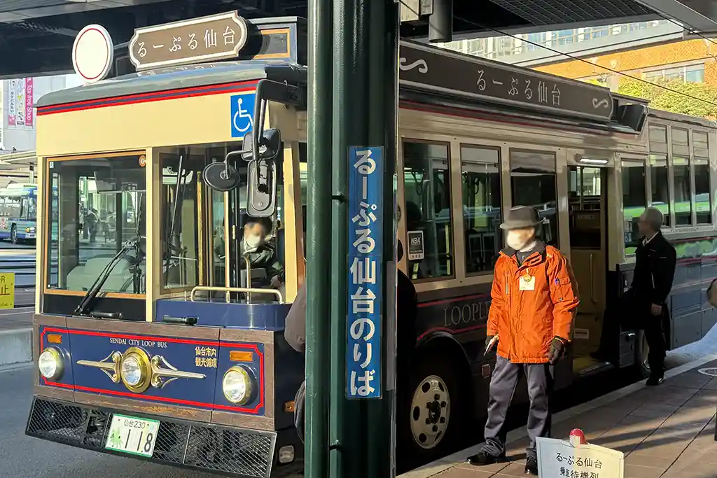 Loople Sendai sightseeing loop bus stopping near Sendai Station for easy access to major city attractions.