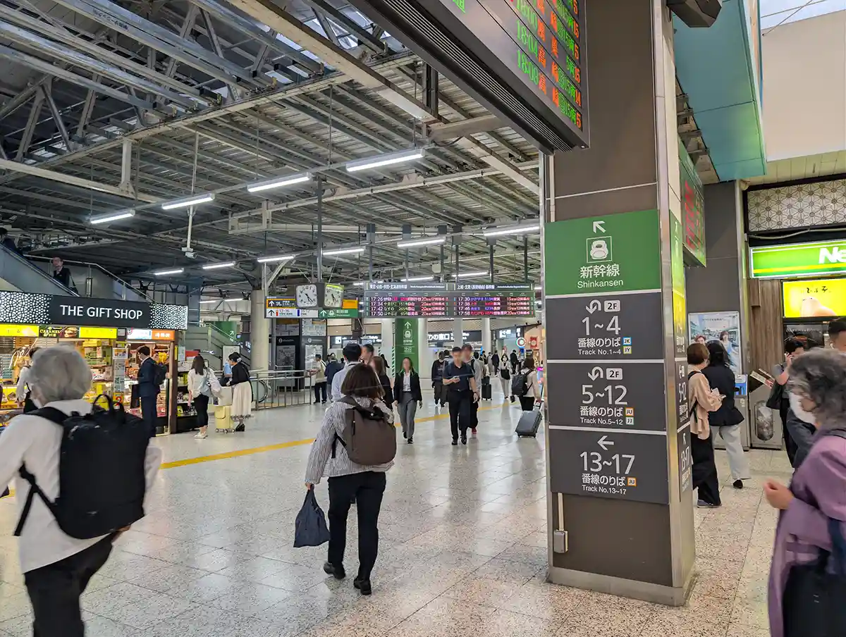 JR Ueno Station local line passage with signs pointing to Shinkansen