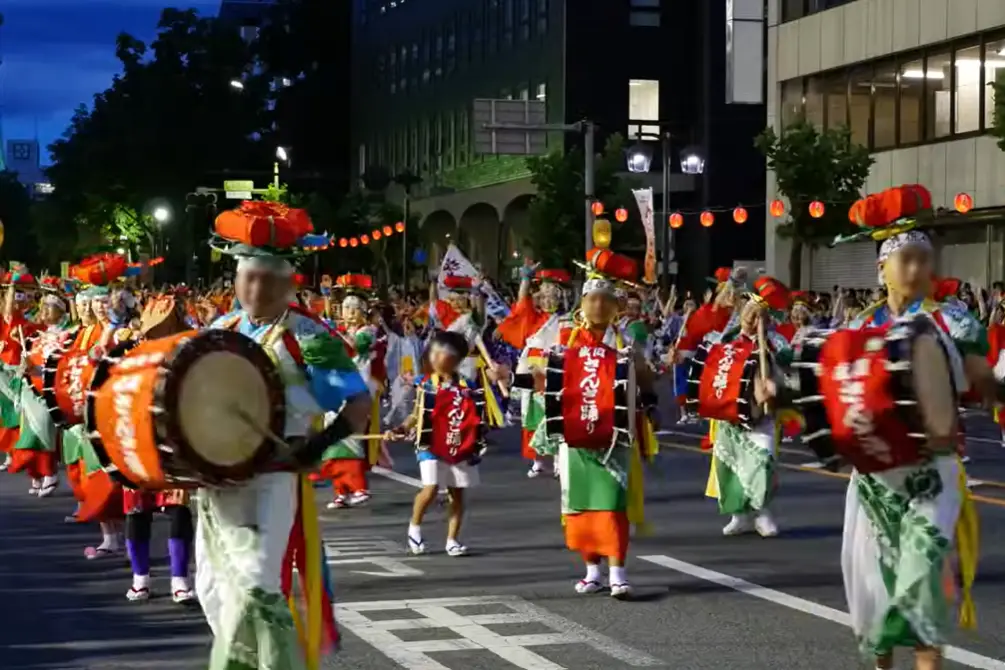 Unified parade of taiko drummers, flutists, singers, and dancers at Morioka Sansa Odori Festival