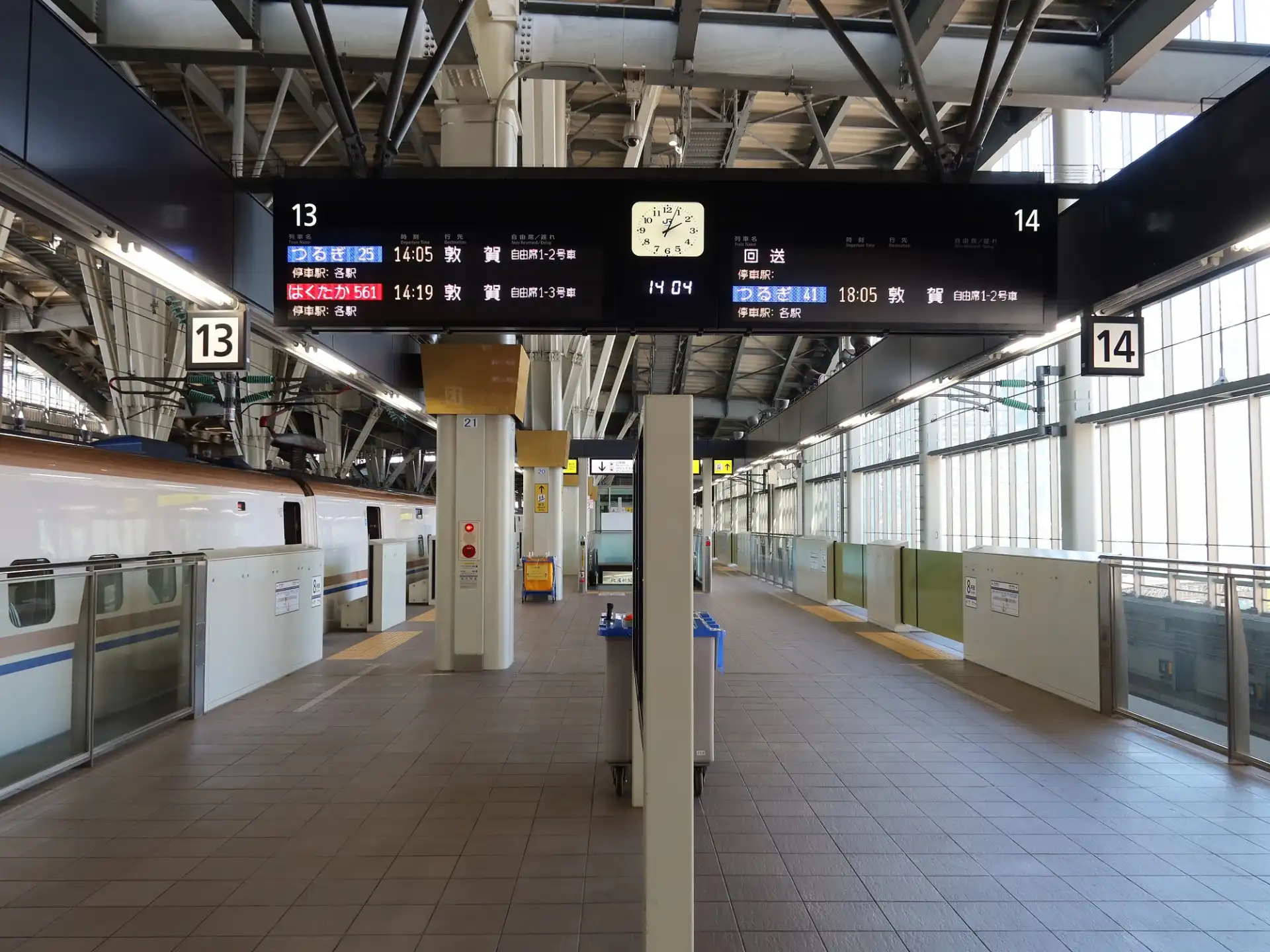 Kanazawa Station Shinkansen platforms showing train information display for Tokyo and Tsuruga routes