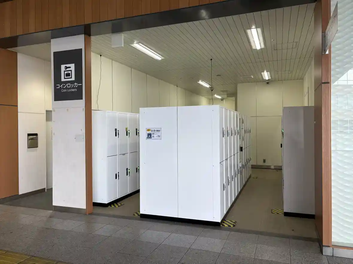 Coin locker area inside Nagano Station with rows of lockers for storing luggage