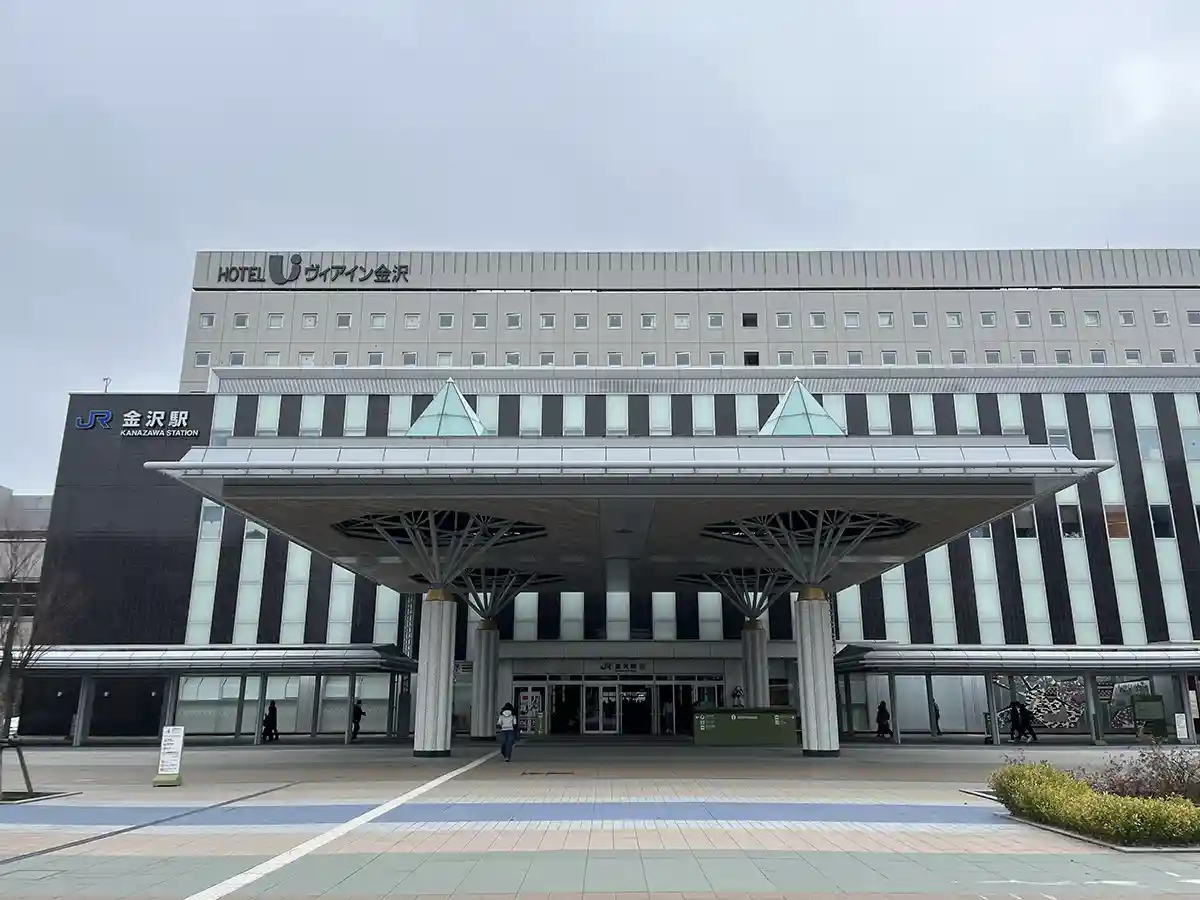 Kanazawa Port Exit at Kanazawa Station exterior with station sign and entrance area.