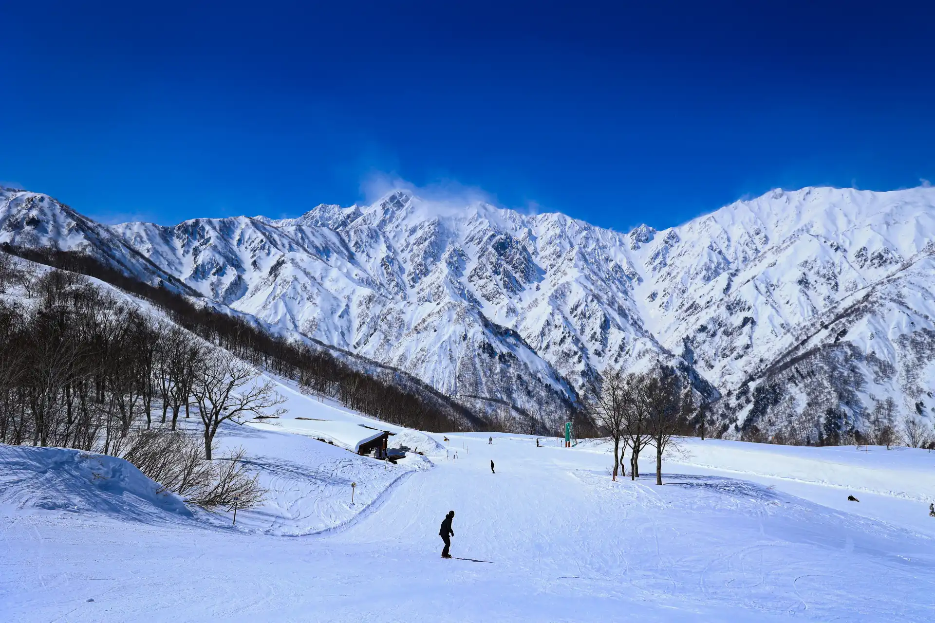Scenic view of Hakuba’s ski slopes and the Japanese Alps, a popular winter destination
