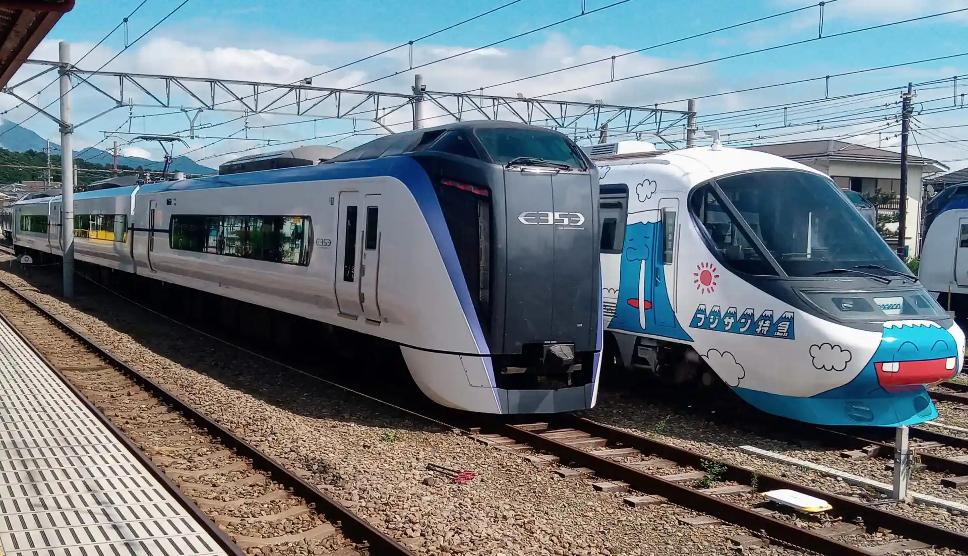 Fuji Excursion train beside the Fujisan Express train operated on the Fujikyu Railway line