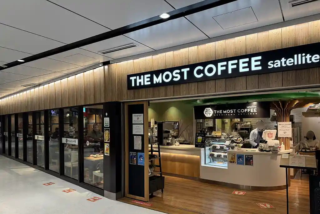 Cafe inside the Shinkansen gates at Sendai Station, where travelers buy coffee and snacks before boarding trains.