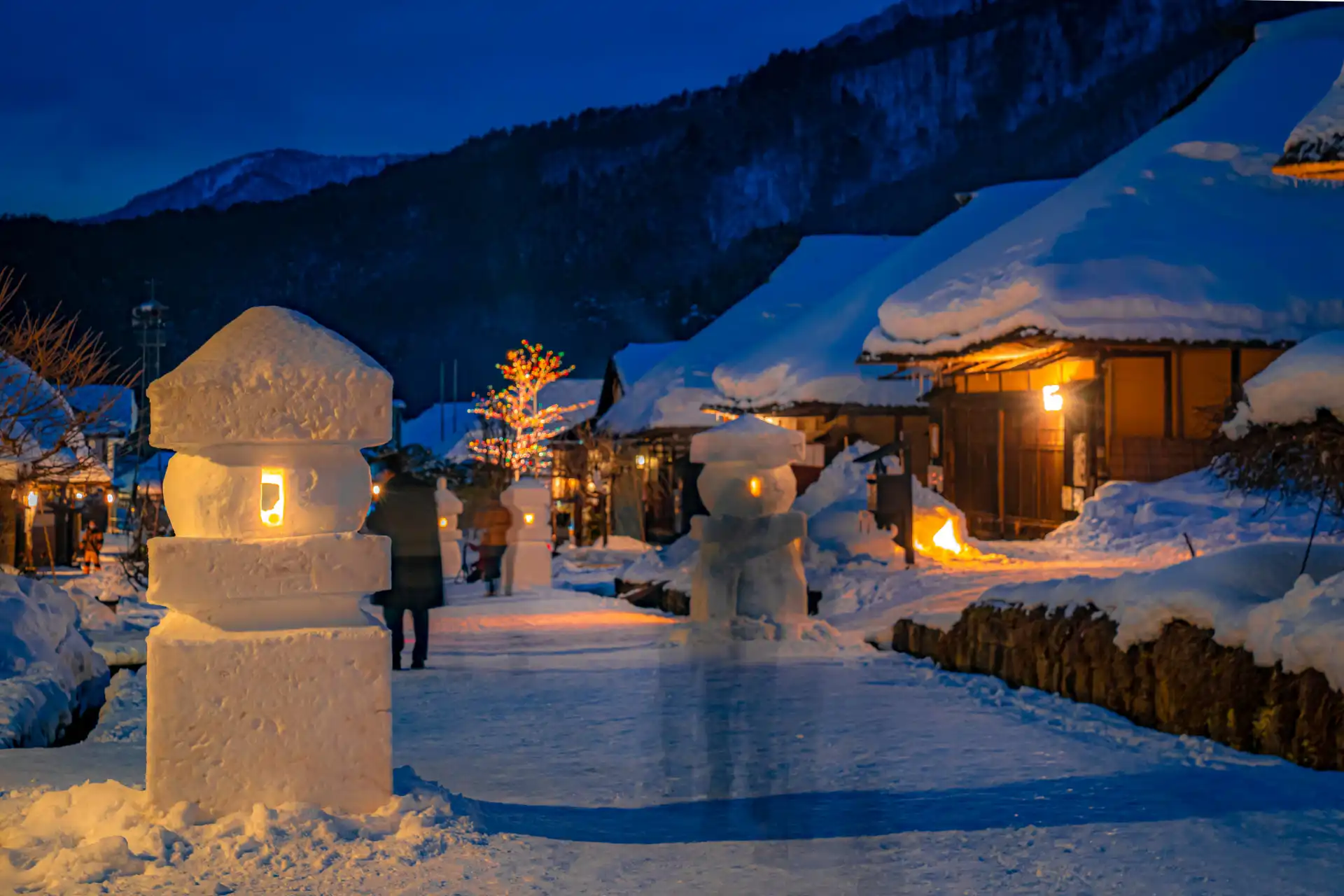 Winter illumination at Ouchi-juku, a historic post town in Fukushima decorated with snow and candlelight