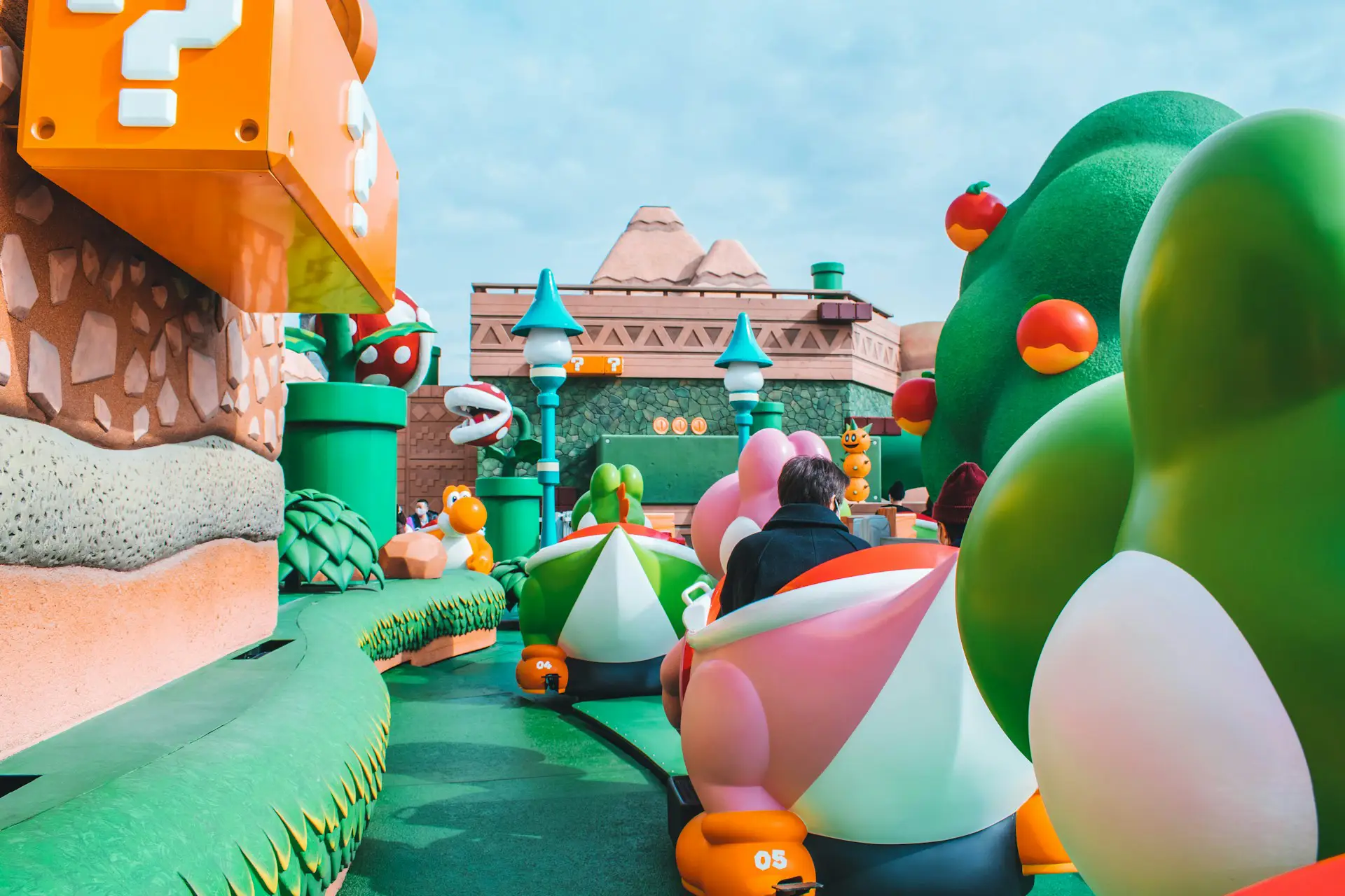 Super Nintendo World ride at Universal Studios Japan with colorful Yoshi-themed attractions