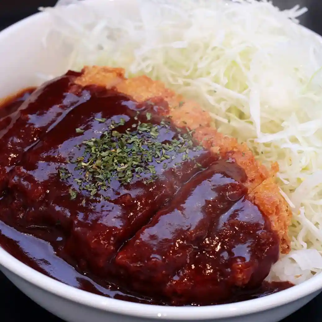 Okayama demi-katsu don with breaded pork cutlet served over rice and topped with demi-glace sauce