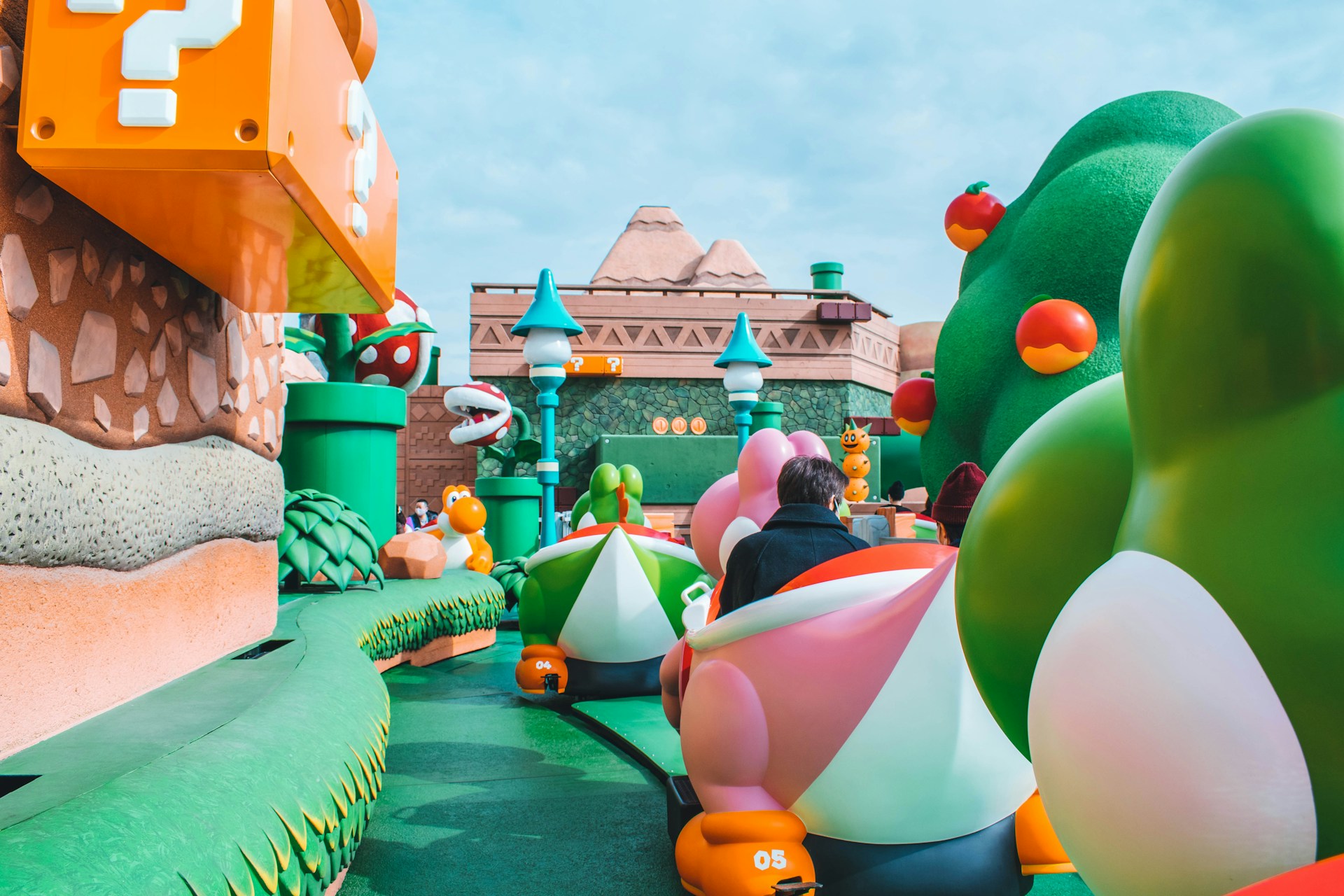 Super Nintendo World ride at Universal Studios Japan with colorful Yoshi-themed attractions