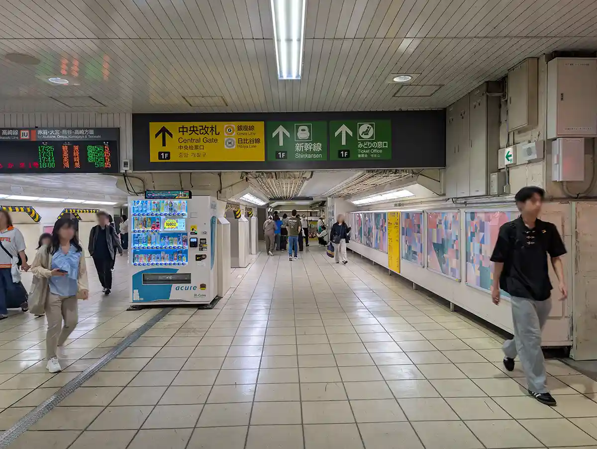 JR Ueno Station local line passage with signs for the Central Gate and Shinkansen
