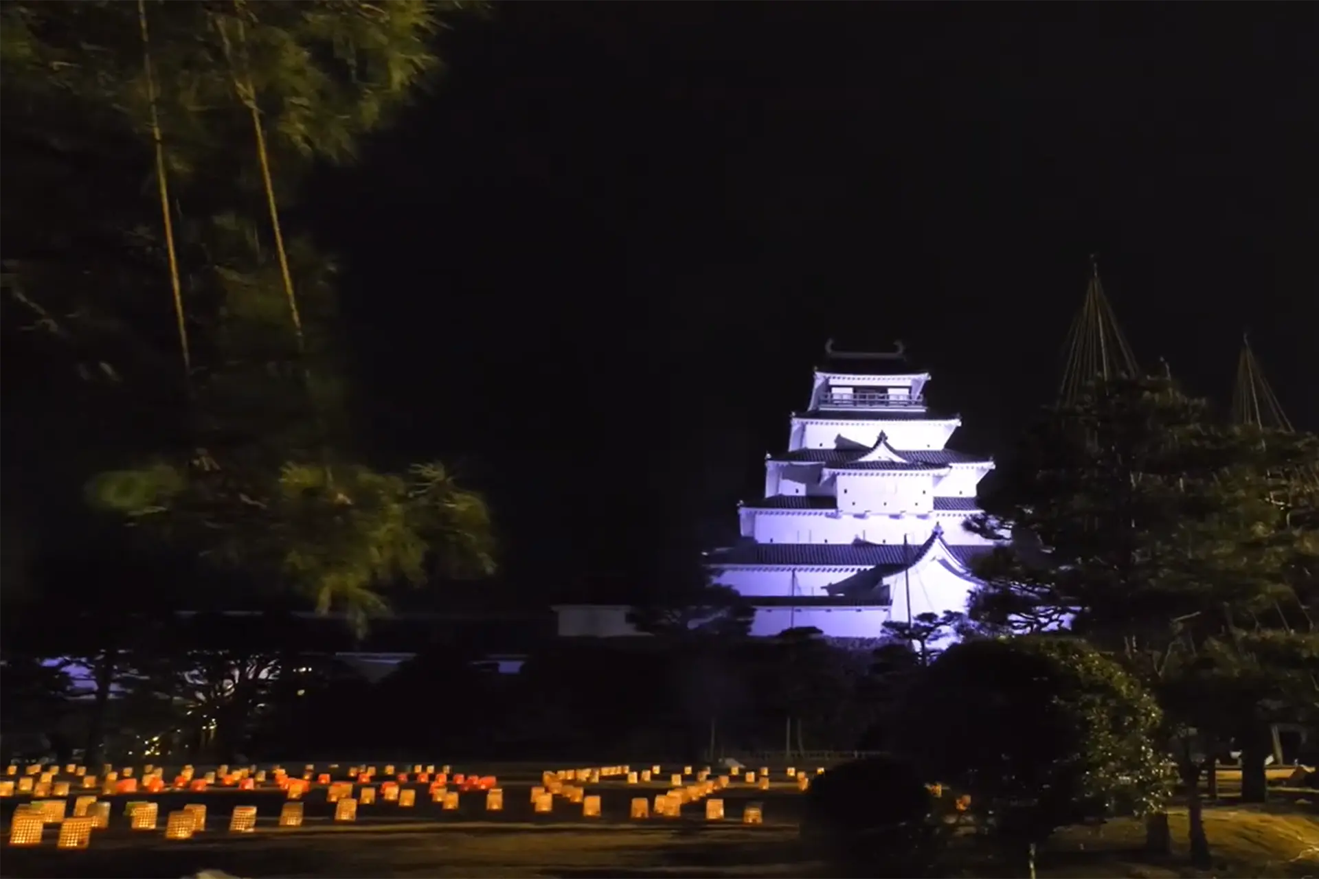 Aizu Painted Candle Festival illuminating Tsuruga-jo Castle with thousands of glowing lanterns