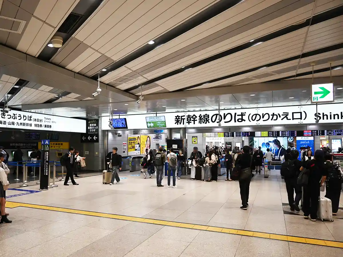 Shinkansen Transfer Gate at Shin-Osaka Station with passengers transferring from JR lines