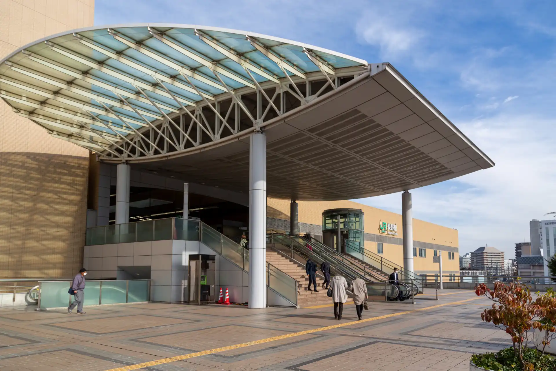 Nagano Station East Exit with glass canopy and escalators