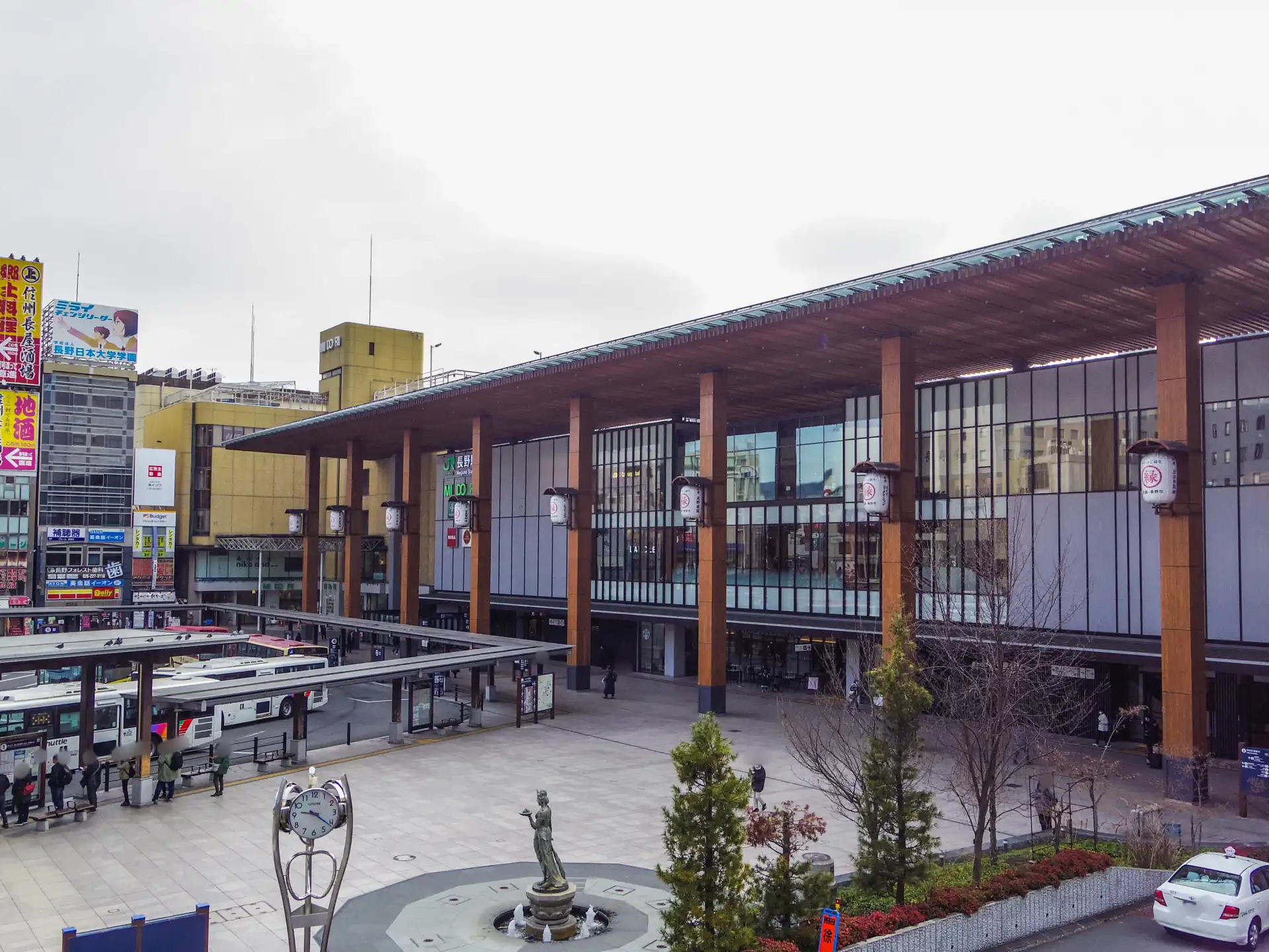 Nagano Station Zenkoji Exit featuring a wooden gate design inspired by Buddhist temple architecture