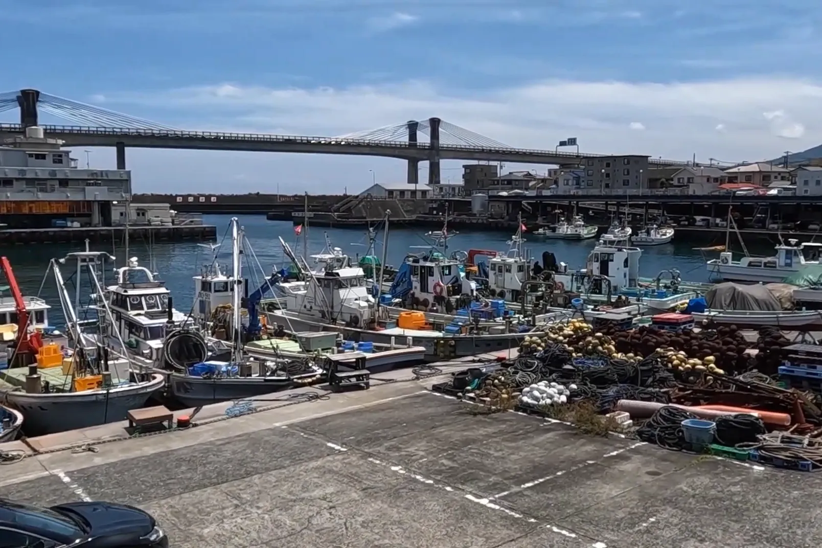 Hayakawa Port in Odawara with fishing boats and harbor bridge