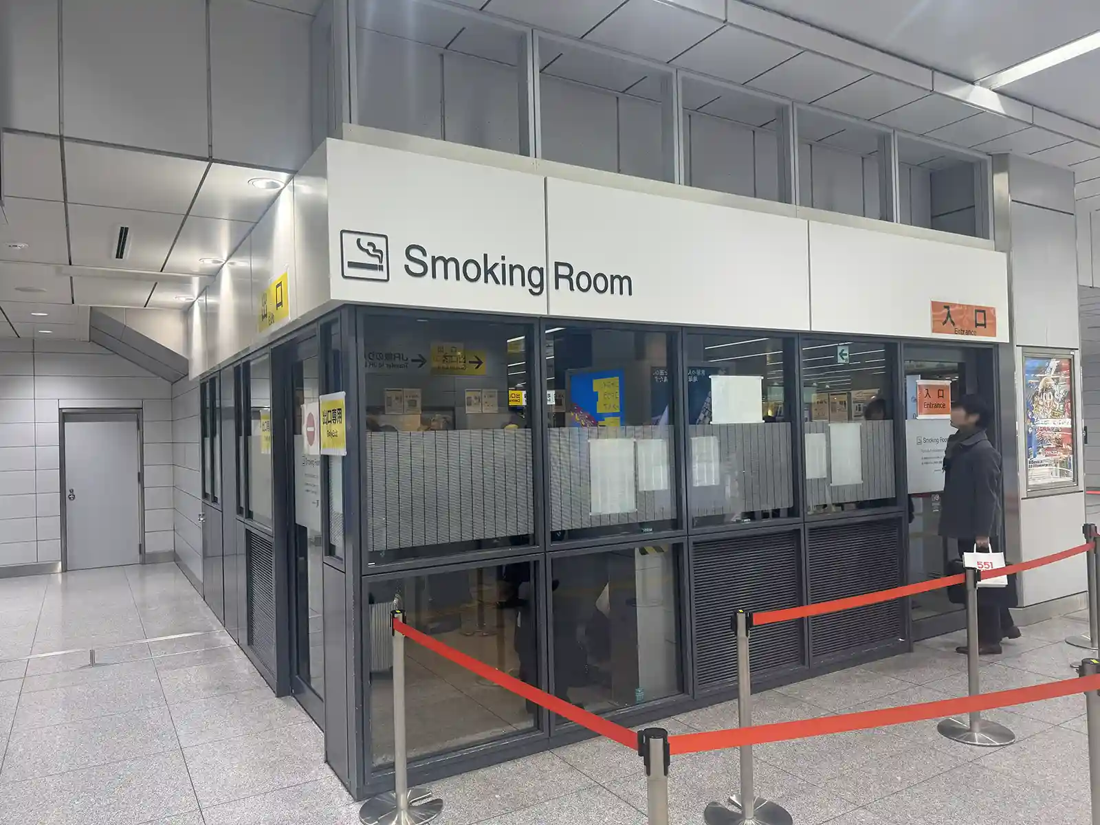 Designated smoking room located inside the Shinkansen ticket gates at Shin-Osaka Station for departing passengers