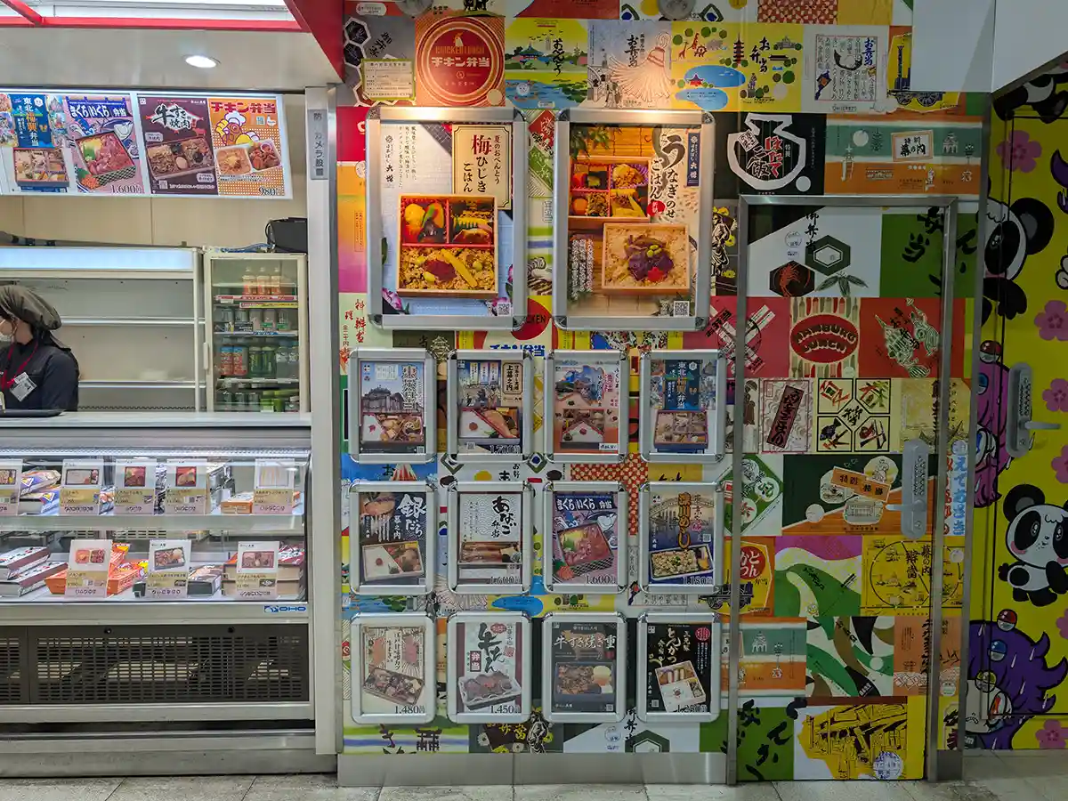 Ueno Station bento shop inside the Shinkansen gate area with ekiben menu displays