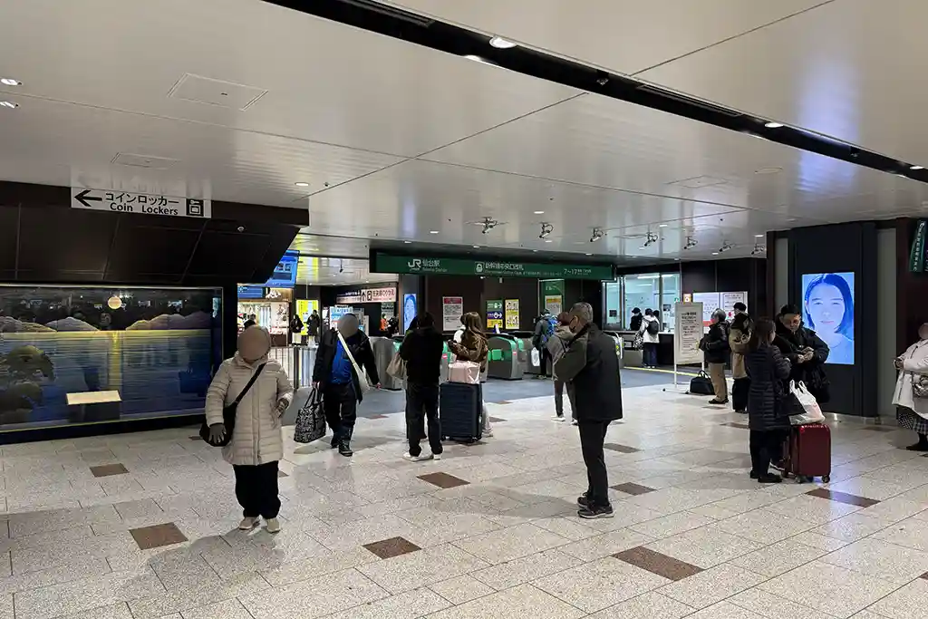 Third floor concourse at Sendai Station where travelers arrive after taking the escalator toward the Shinkansen area.