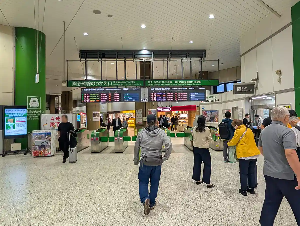 JR Ueno Station Shinkansen Transfer Gate with ticket gates and departure boards overhead
