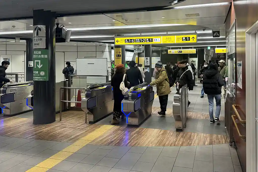 Sendai City Subway ticket gates at Sendai Station where passengers pass through to enter and exit the subway area.