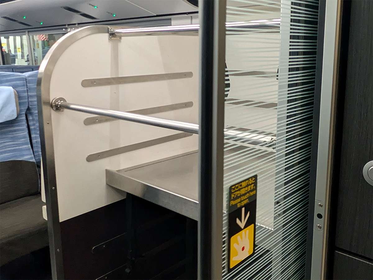 Large luggage storage area inside the Fuji Excursion for suitcases and bulky travel bags