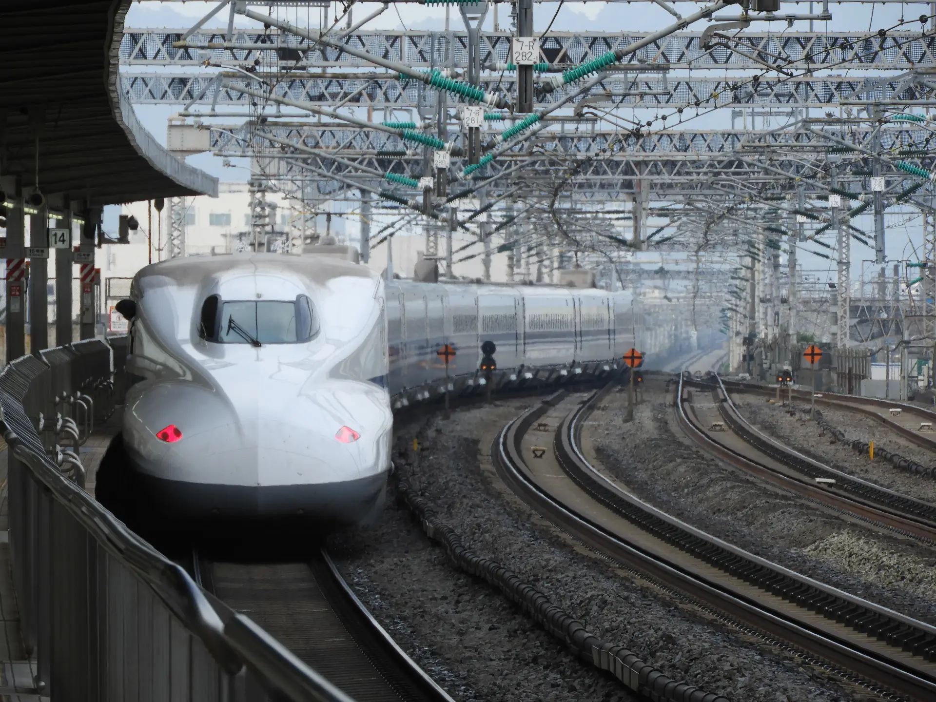 Shinkansen approaching platform at Odawara Station in Kanagawa