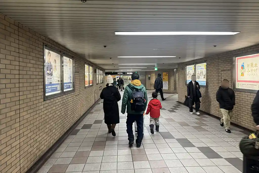 Sendai Station West Exit underground walkway where passengers walk between the station area and nearby exits.