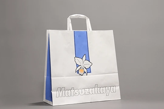 松坂屋, 旧一般用 中央のカトレヤが印象的 色彩もあってレトロな構成