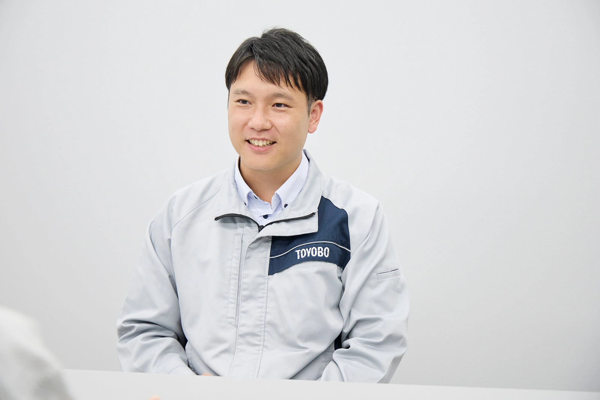 インタビューを受ける山口さん