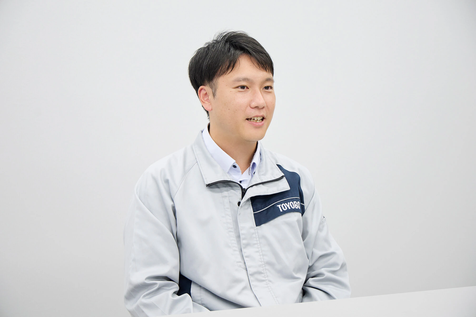 インタビューを受ける山口さん